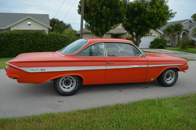 1961 Chevrolet Impala (hugger orange/?)