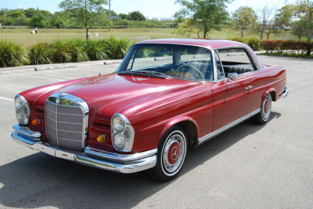 1965 Mercedes-Benz 200-Series (Ruby Red/Black)