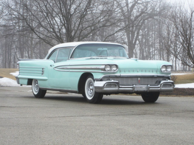 1958 Oldsmobile Ninety-Eight (Two-tone Surf Green/Alaskan White/tri-color-green leather, cloth and moroceen)
