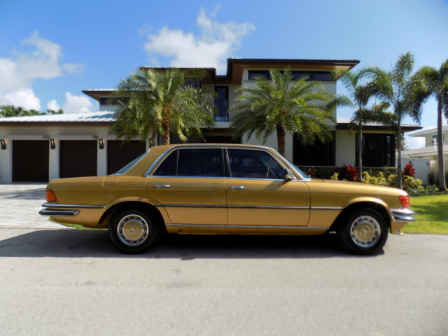 1977 Mercedes-Benz 200-Series (Ikon Gold Metallic/Black cloth)