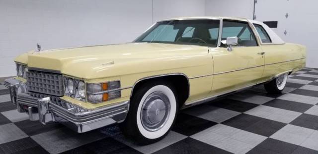 seller of classic cars 1974 cadillac deville green beige