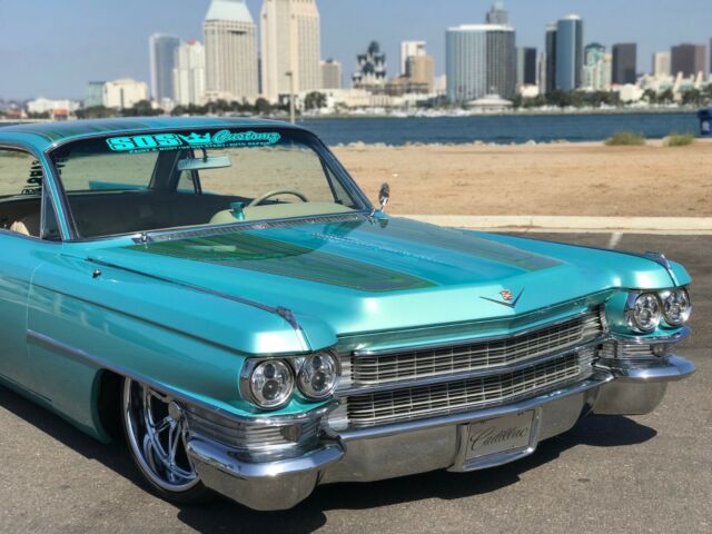 1963 Cadillac DeVille (TEAL PEARL/TAN)