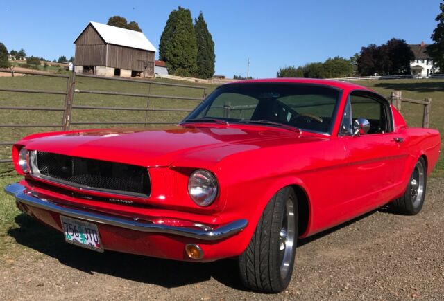 1965 Ford Mustang (Ford Race Red/Custom black w red stitching)