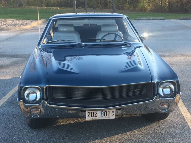 1969 AMC AMX (Met Blue/Platinum-Silver.)