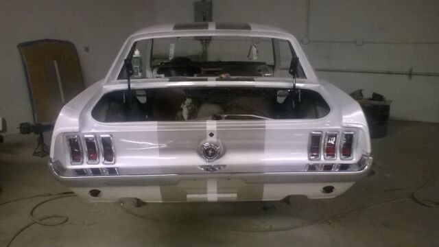 1967 Ford Mustang (3 stage Pearl w silver metallic stripes/Saddle-deluxe interior)